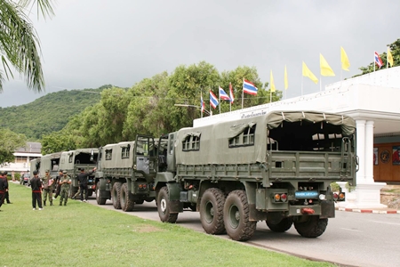 With dark skies as a backdrop, the navel convoy prepares to leave to assist flood-relief efforts in Ayutthaya.